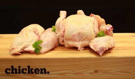 Raw chicken on a cutting board